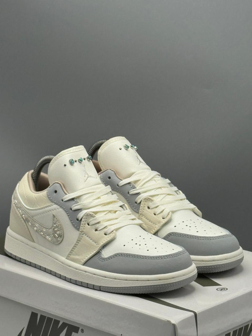 Jordan 1 Retro Low “Pearl Grey Luxe”