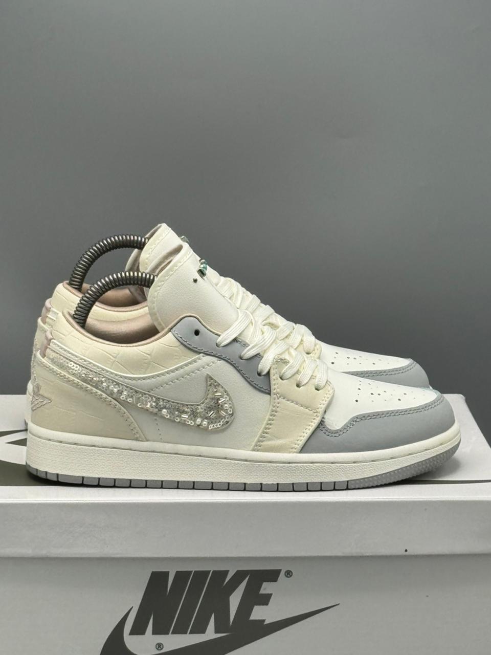Jordan 1 Retro Low “Pearl Grey Luxe”
