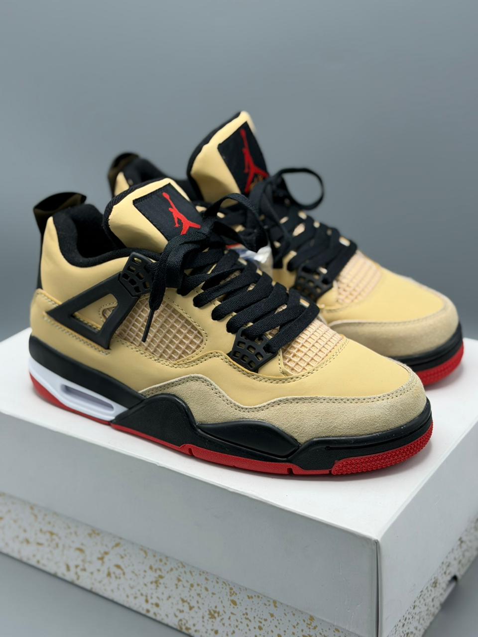 Jordan 4 Retro “Sand Black Red”