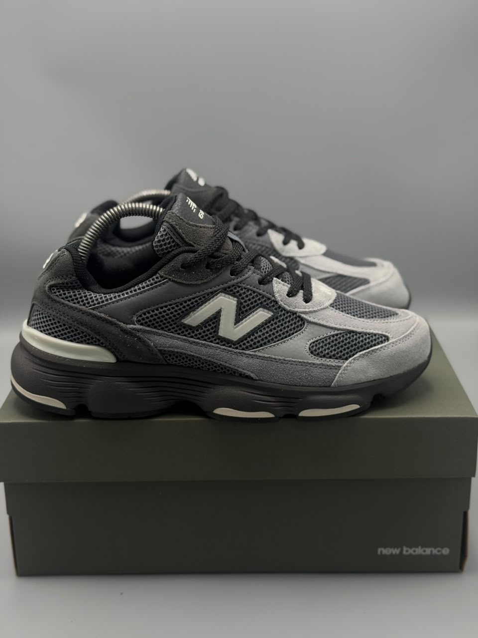 New Balance 509 – Gris / Negro / Blanco